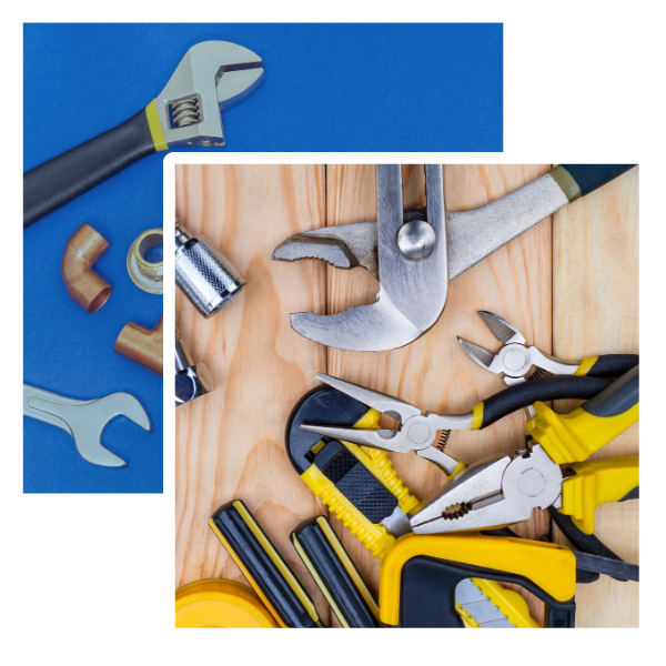Plumbing tools including wrenches, pliers, and fittings on a wooden surface, representing plumbing services in Stapleford.