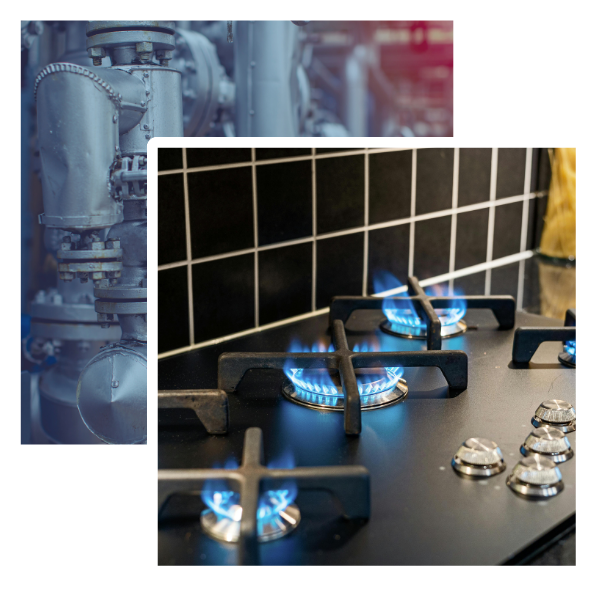 Gas burners ignited on a black kitchen countertop and industrial gas equipment in the background, symbolizing gas safety services for landlords in Long Eaton and Stapleford.